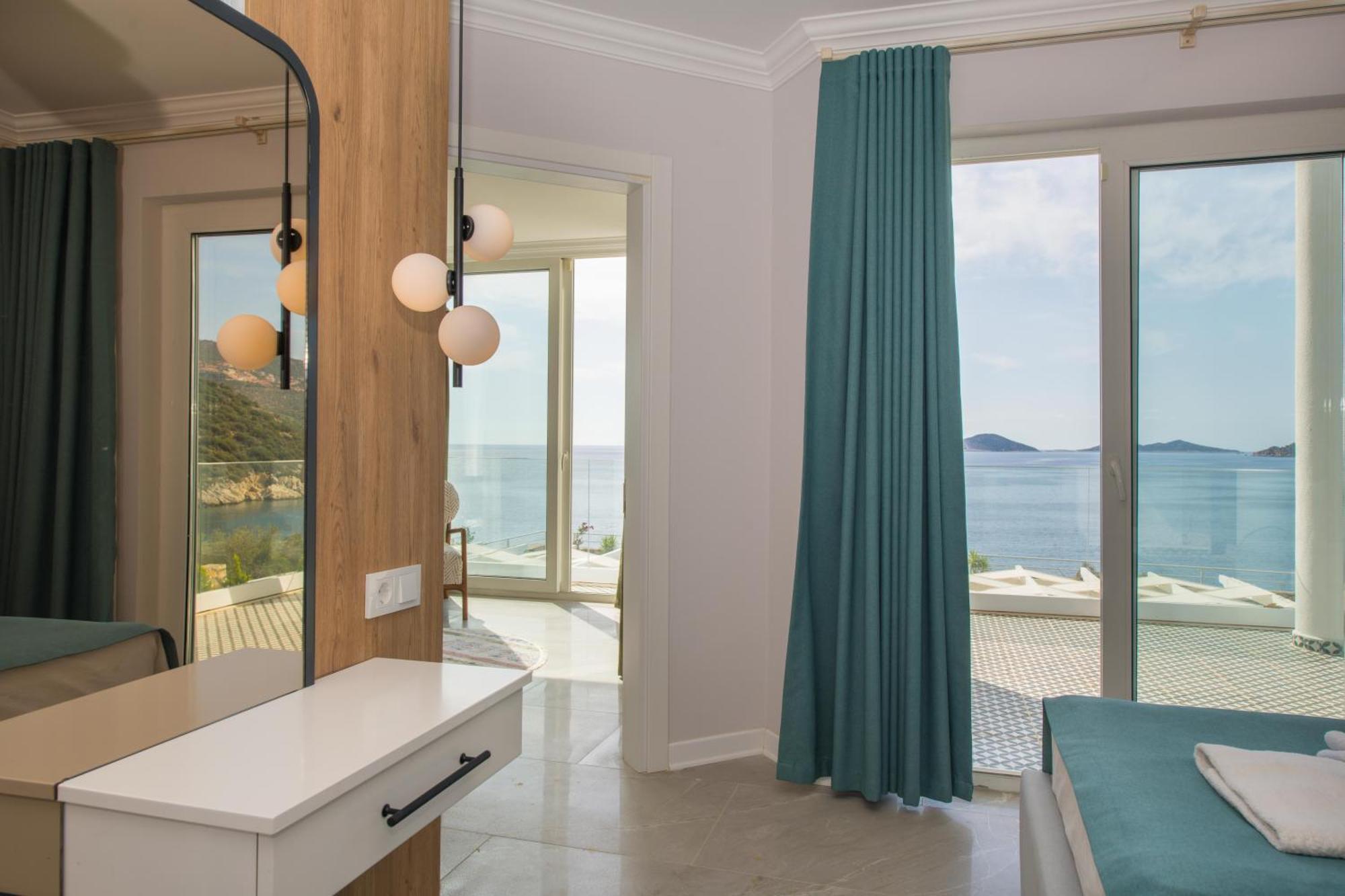 Beachfront White Villa With Private Swimming Pool Kalkan Bagian luar foto