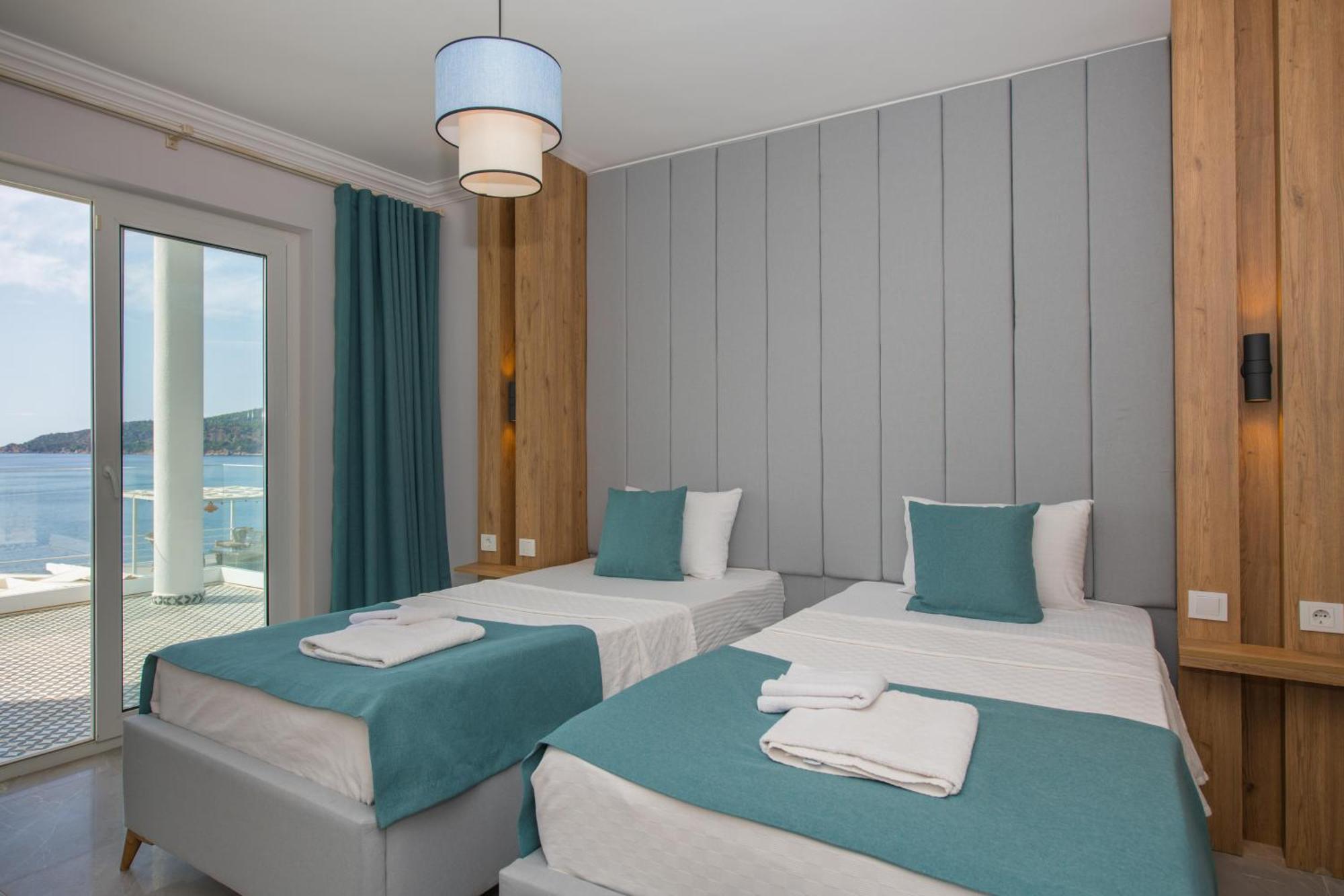 Beachfront White Villa With Private Swimming Pool Kalkan Bagian luar foto